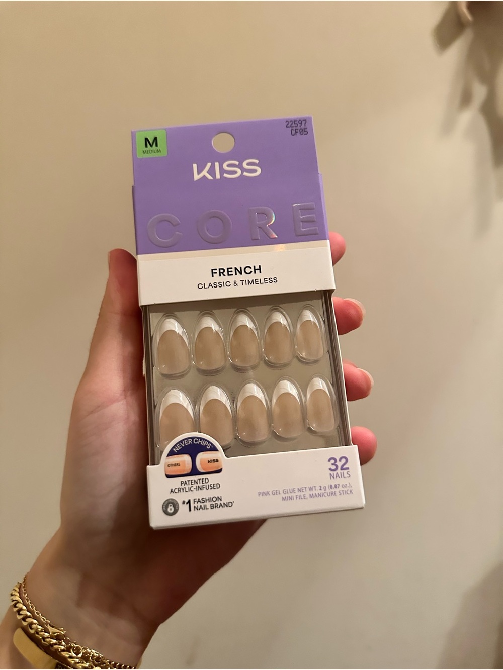 KISS Core French Press-On Nails in Lavender Packaging with White Tips